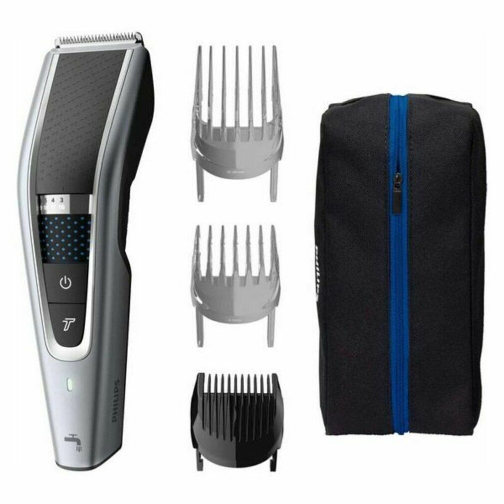 Philips Haarschneider mit drei Aufsätzen und einer schwarzen Tasche mit blauem Reißverschluss. Silbernes und schwarzes Gerät.