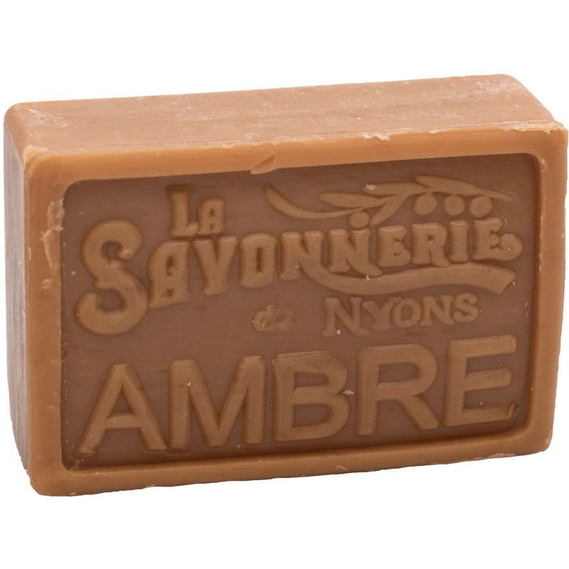 Rechteckige Seife, bernsteinfarben. Geprägt mit "La Savonnerie de Nyons AMBRE".