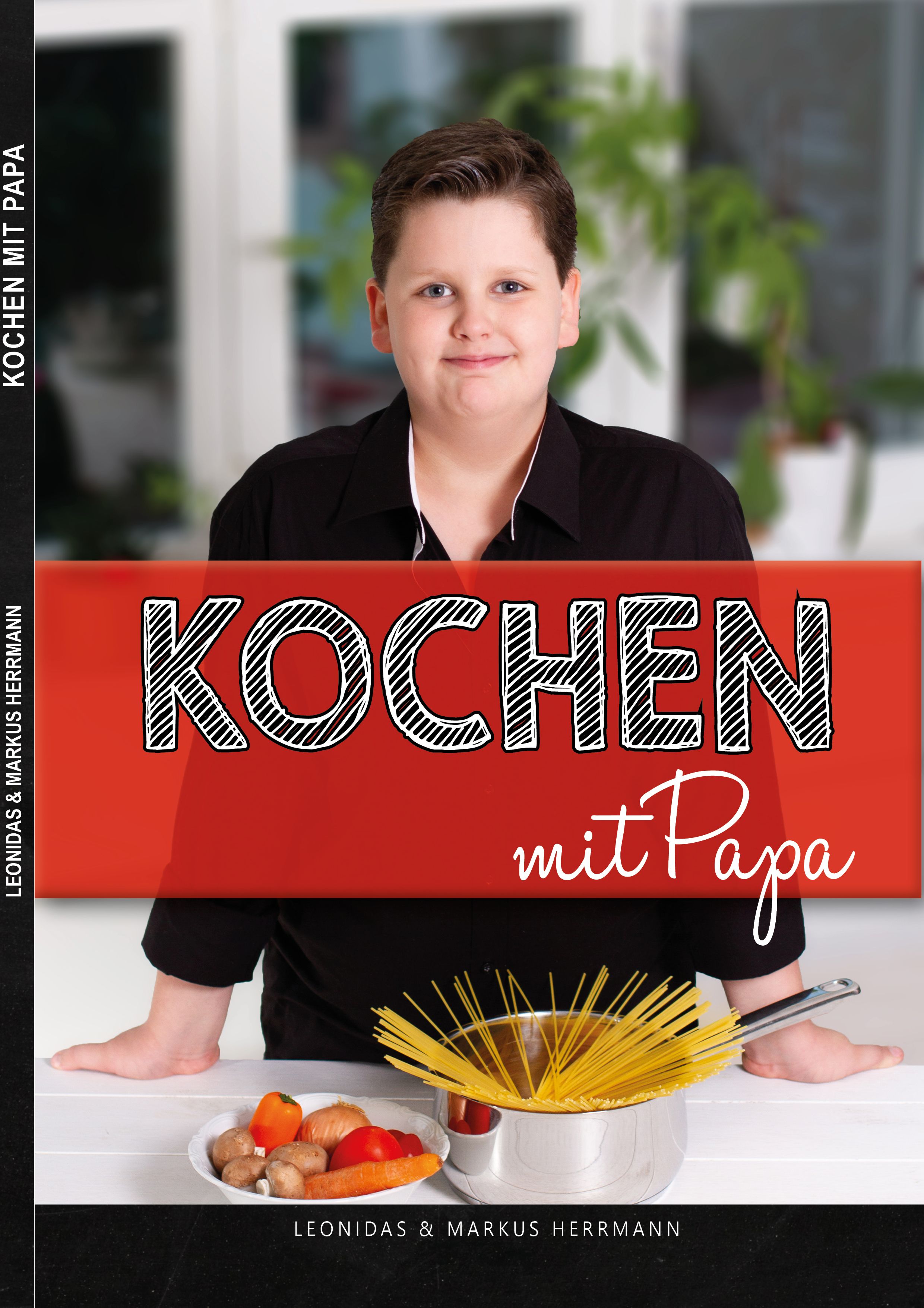 Buchcover mit Titel "Kochen mit Papa". Junge Person vor rotem Banner. Auf Tisch: Gemüse, Pilze, Spaghetti in Topf.
