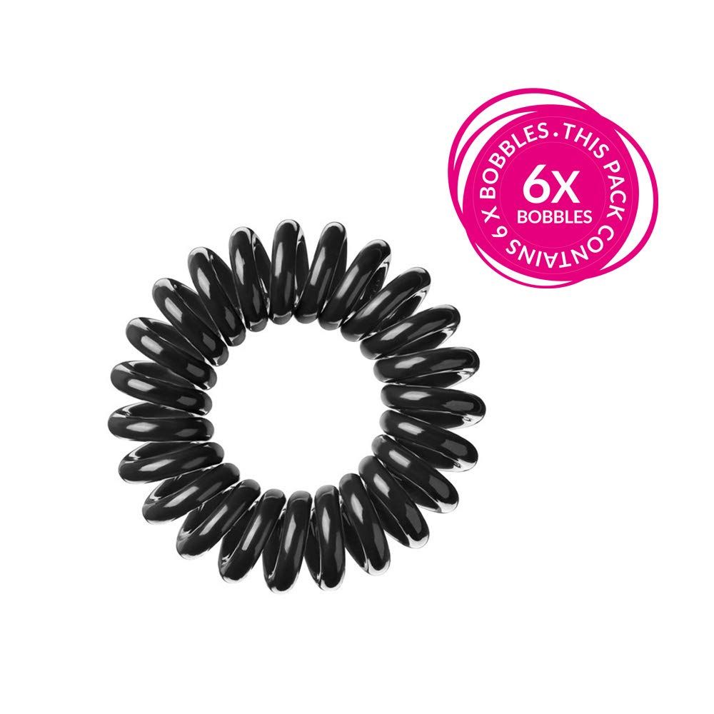 Schwarzes, spiralförmiges Haargummi mit rosa Verpackung. Aufschrift: 6x Bobbles.