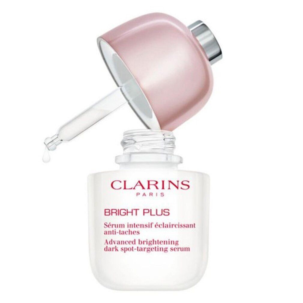 Clarins Bright Plus Serum-Flakon mit Pipette. Weißes Fläschchen mit rosa Deckel. Aufschrift: Bright Plus, Serum intensif éclaircissant anti-taches.