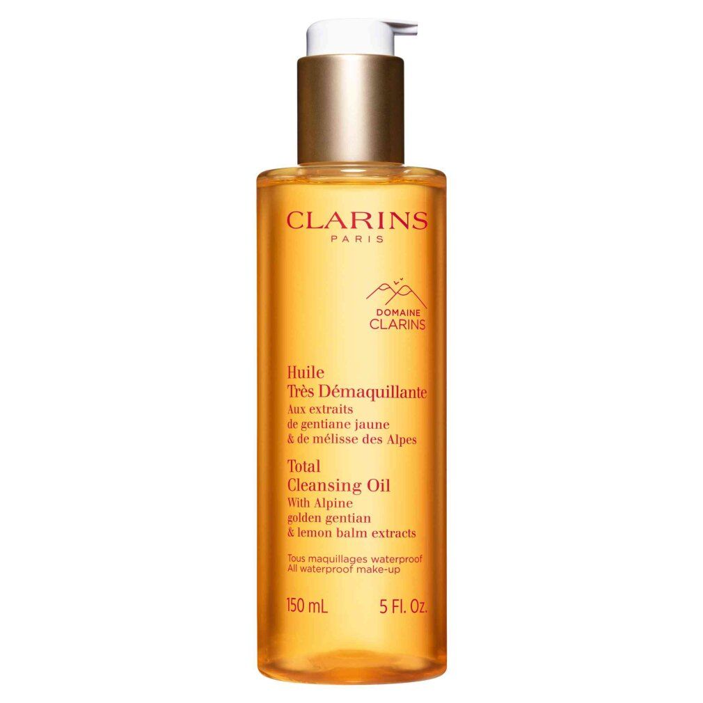 Clarins Total Cleansing Oil: goldfarbene Reinigungsölflasche mit Pumpspender. Enthält alpine Extrakte.