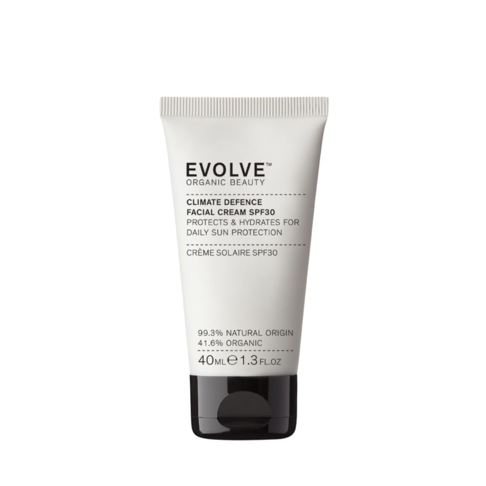 Weiße Tube mit schwarzem Deckel. Aufschrift: EVOLVE ORGANIC BEAUTY, Climate Defence Facial Cream SPF30, 40ml.