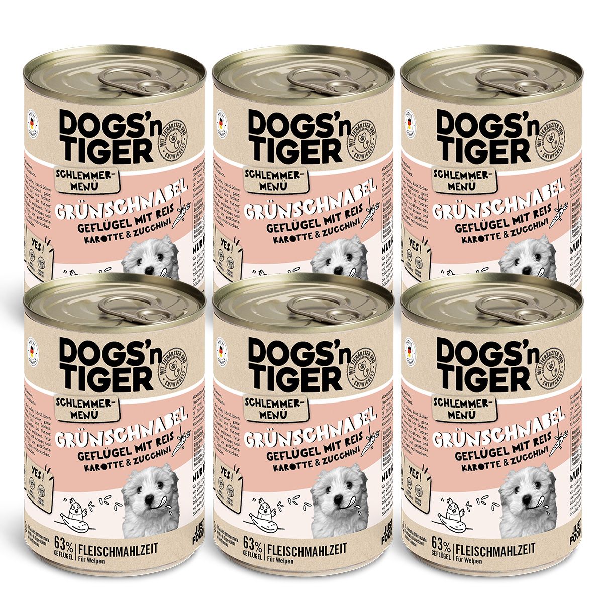 Sechs Dosen Hundefutter. Auf jeder Dose ist das Logo Dogs'n Tiger, Grünschnabel, Geflügel mit Reis, Karotte & Zucchini abgebildet.
