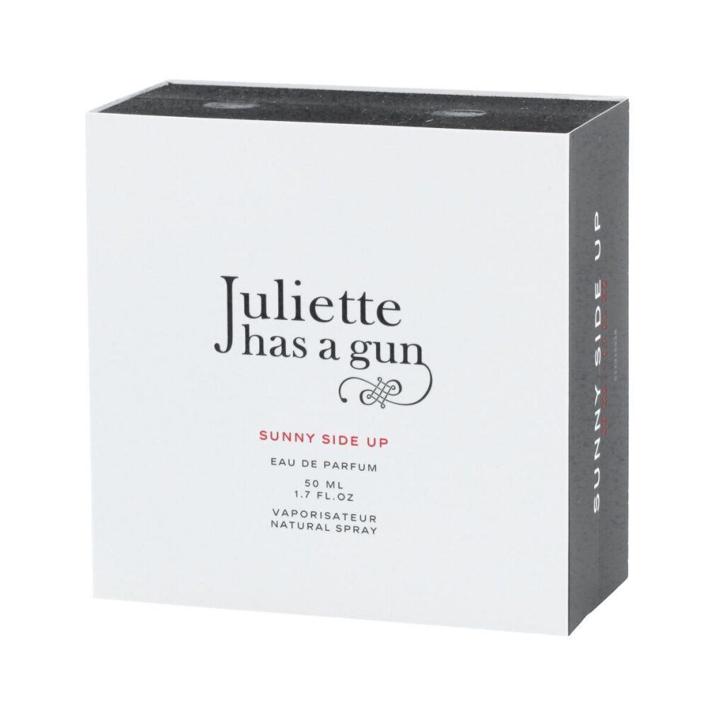 Weiße Schachtel mit schwarzem Deckel. Aufschrift: Juliette has a gun, Sunny Side Up, Eau de Parfum, 50 ml.