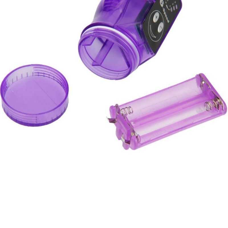 Lila Vibrator, geöffnet, mit Batteriefach und abgenommener Kappe.