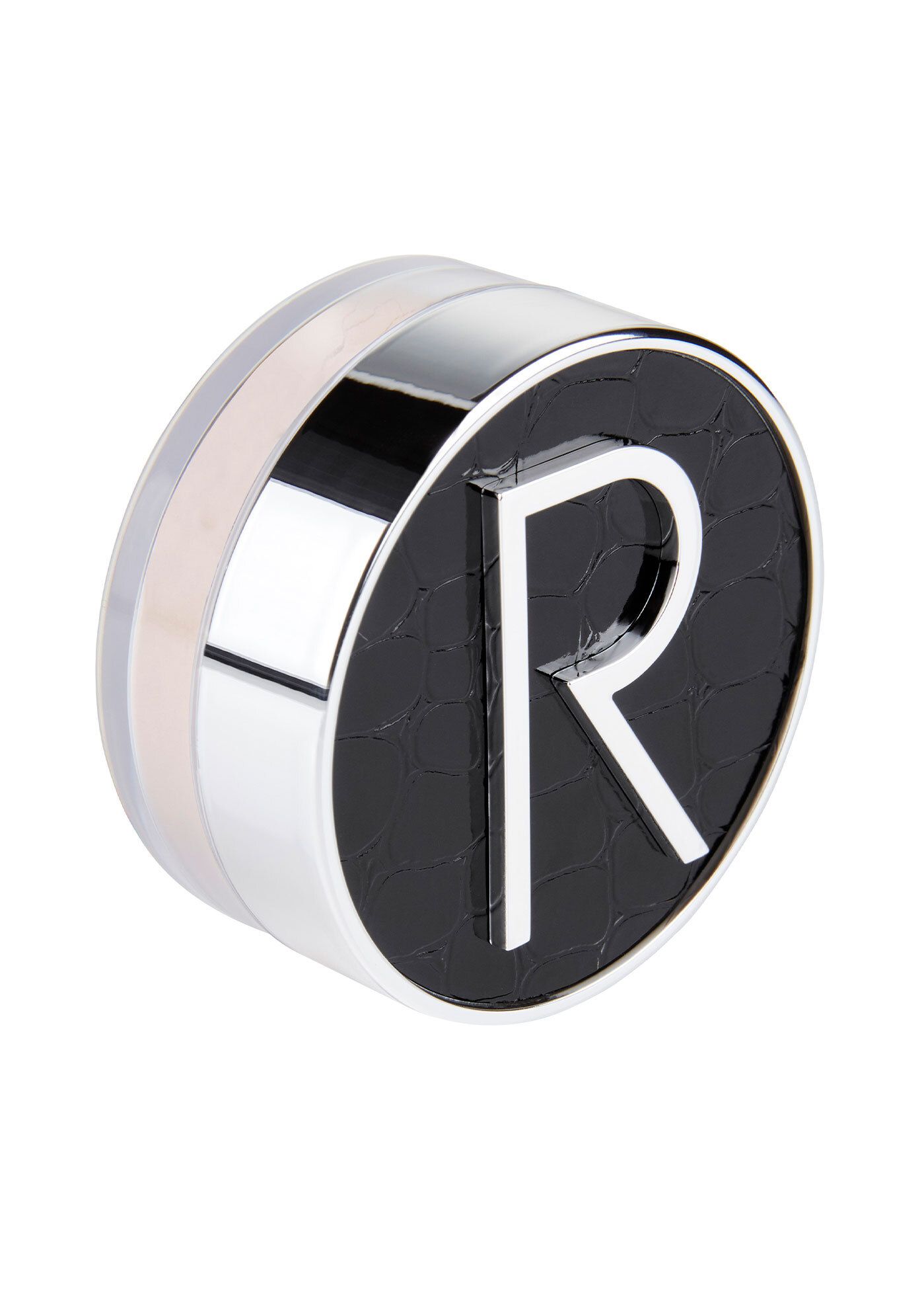 Runder Behälter mit losem Puder. Schwarzer Deckel mit silbernem "R"-Logo. Silberner Rand. Hellbraunes Puder sichtbar.