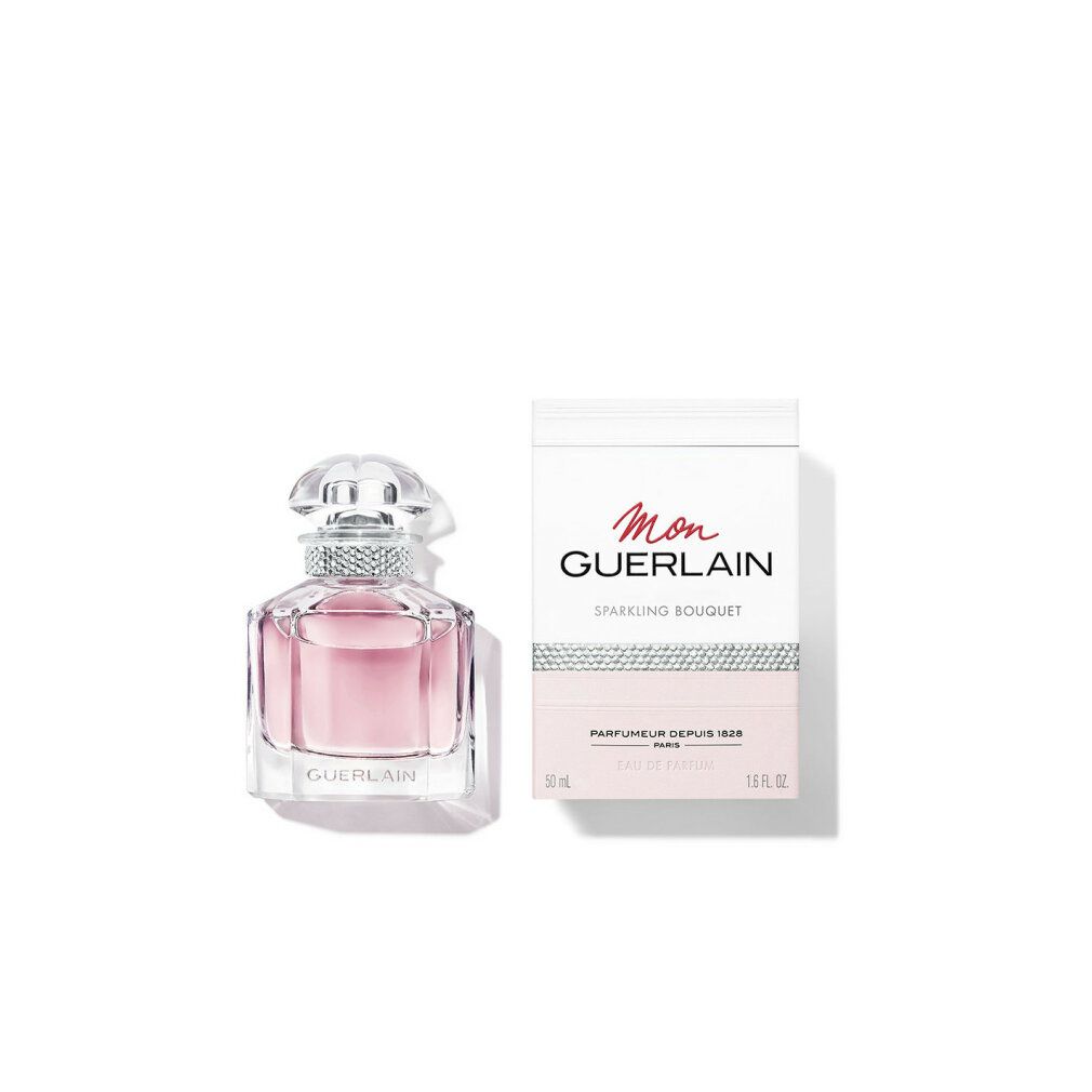 Parfümflakon und Verpackung. Flakon mit rosa Flüssigkeit. Verpackung mit Schriftzug Mon Guerlain Sparkling Bouquet.
