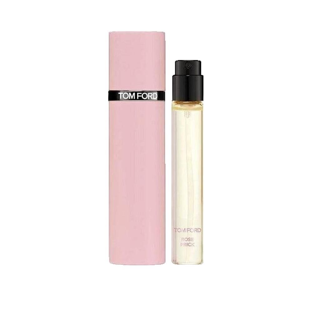 Rosa-Prick-Parfüm. Rosa Hülle mit schwarzem Schriftzug TOM FORD. Transparente Flasche mit schwarzem Zerstäuber.
