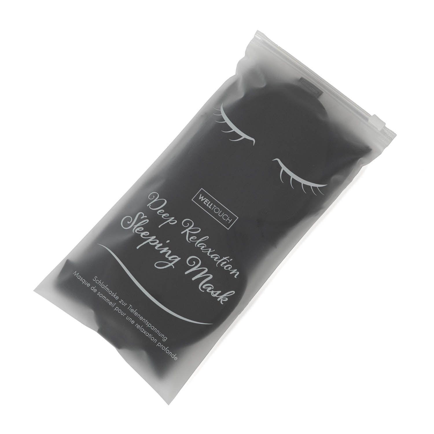 Schwarze Schlafmaske in transparenter Verpackung mit "Deep Relaxation Sleeping Mask" Aufschrift.