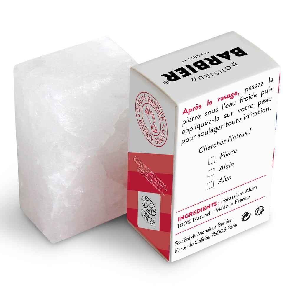 Alaunstein und Verpackung. Verpackung mit Text und Logo. 'Monsieur BARBIER' und 'Pierre d'Alun' sichtbar.