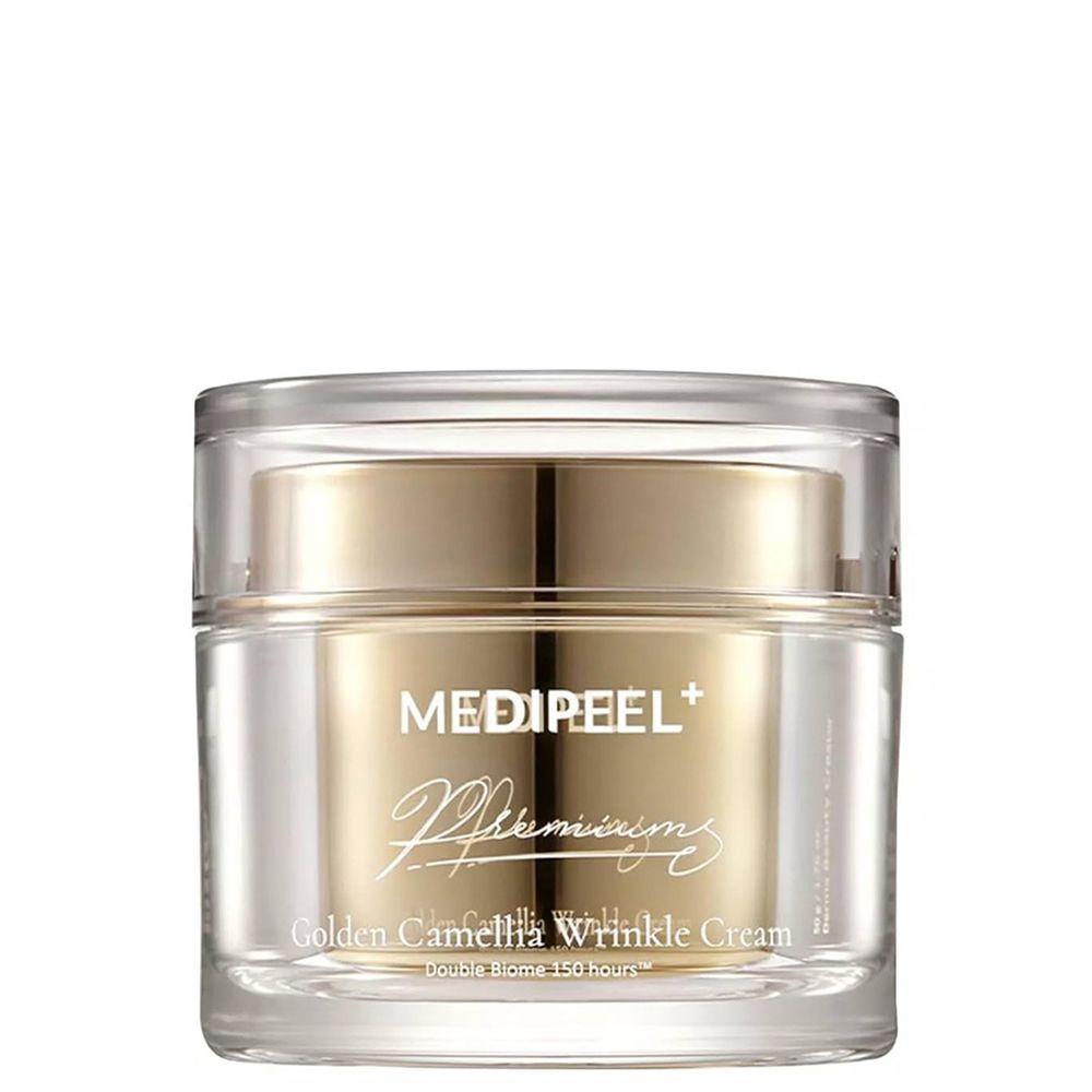 Medi-Peel Premium Golden Camellia Faltencreme in einem transparenten Glasbehälter mit goldenem Deckel.