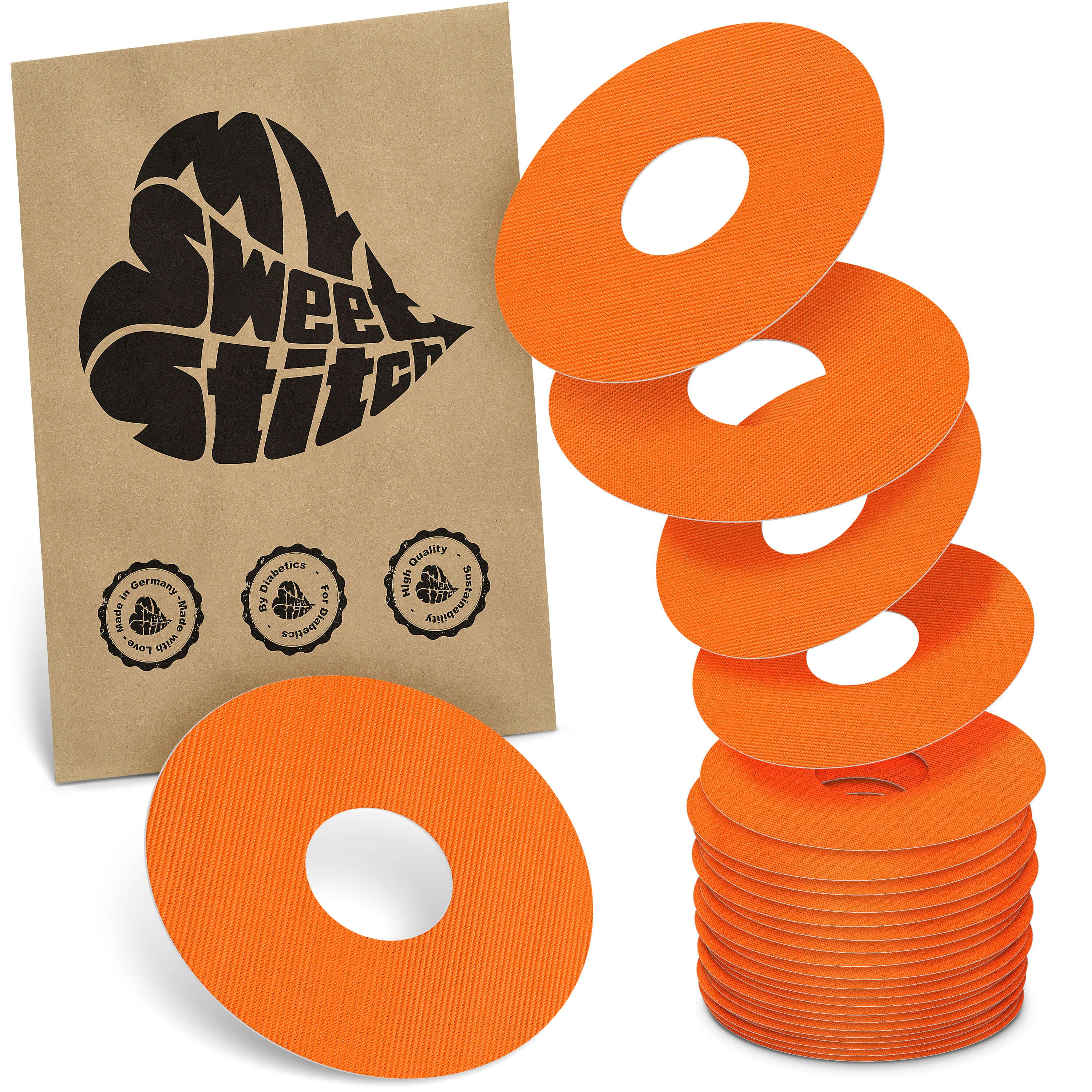 Orange Ringpatches für Freestyle Libre 3/3 Plus, 5 Stück sichtbar, mit brauner Verpackung.