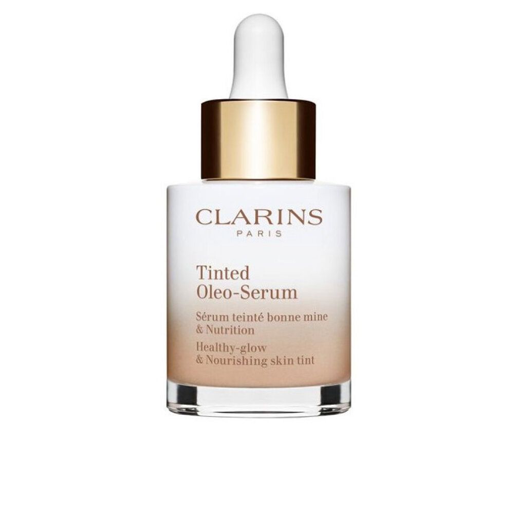 Flakon mit Pipette. Aufschrift: Clarins Paris, Tinted Oleo-Serum. Farbverlauf von Weiß zu Beige.