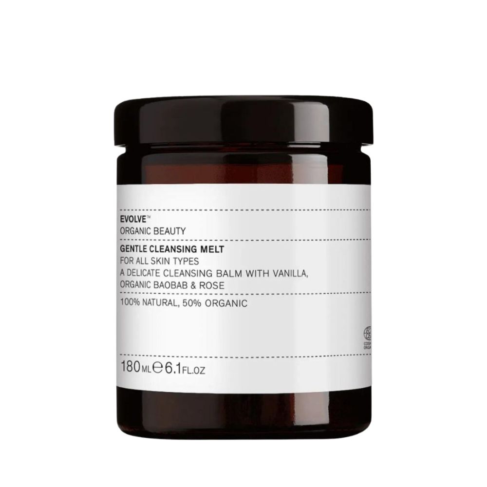 Braune Glasdose mit schwarzem Deckel. Auf weißem Etikett: "GENTLE CLEANSING MELT" und weitere Produktinformationen. 180ml.
