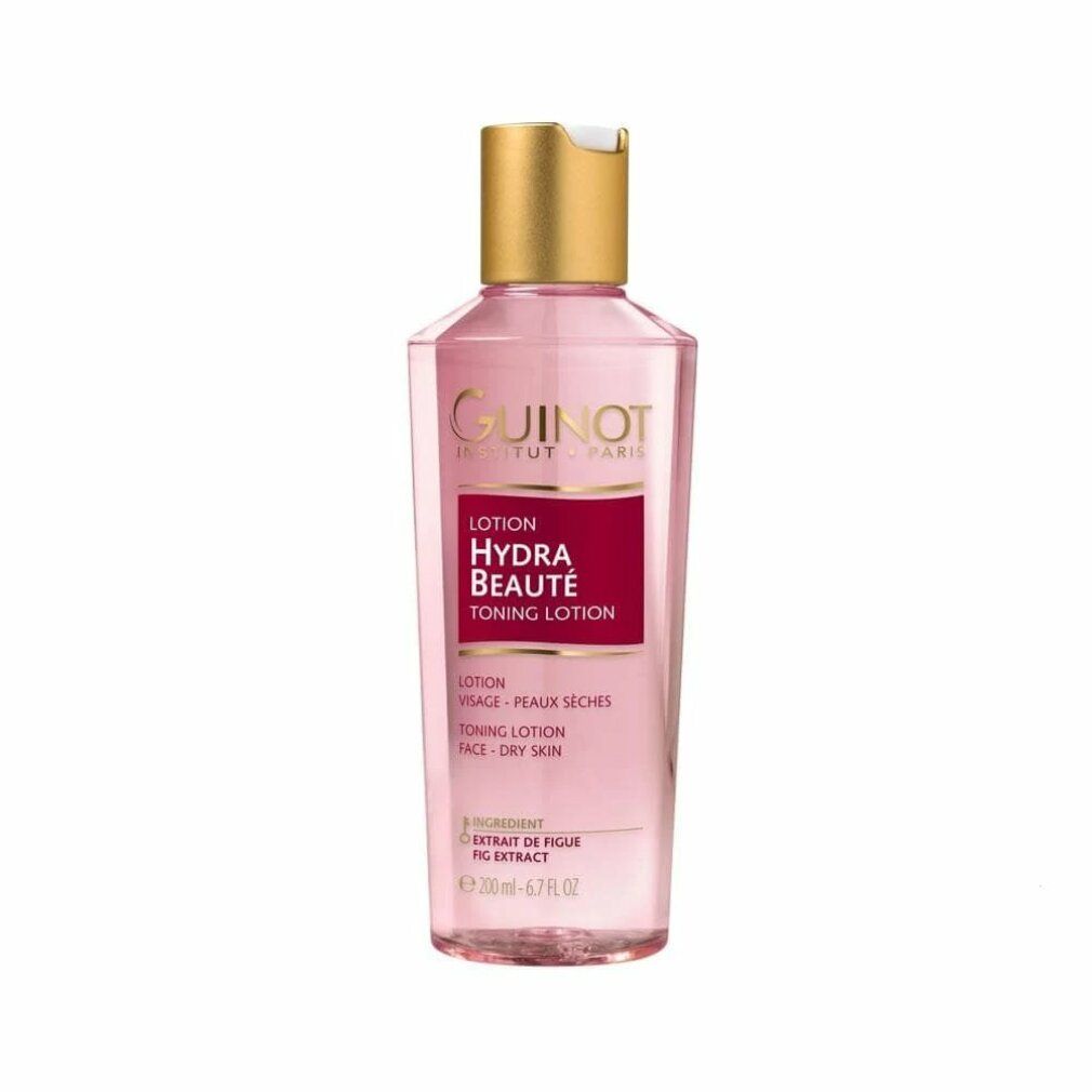 Guinot Hydra Beaute Lotion. Transparente Flasche mit rosafarbener Flüssigkeit. Goldfarbener Deckel. Roter Aufkleber mit Text.