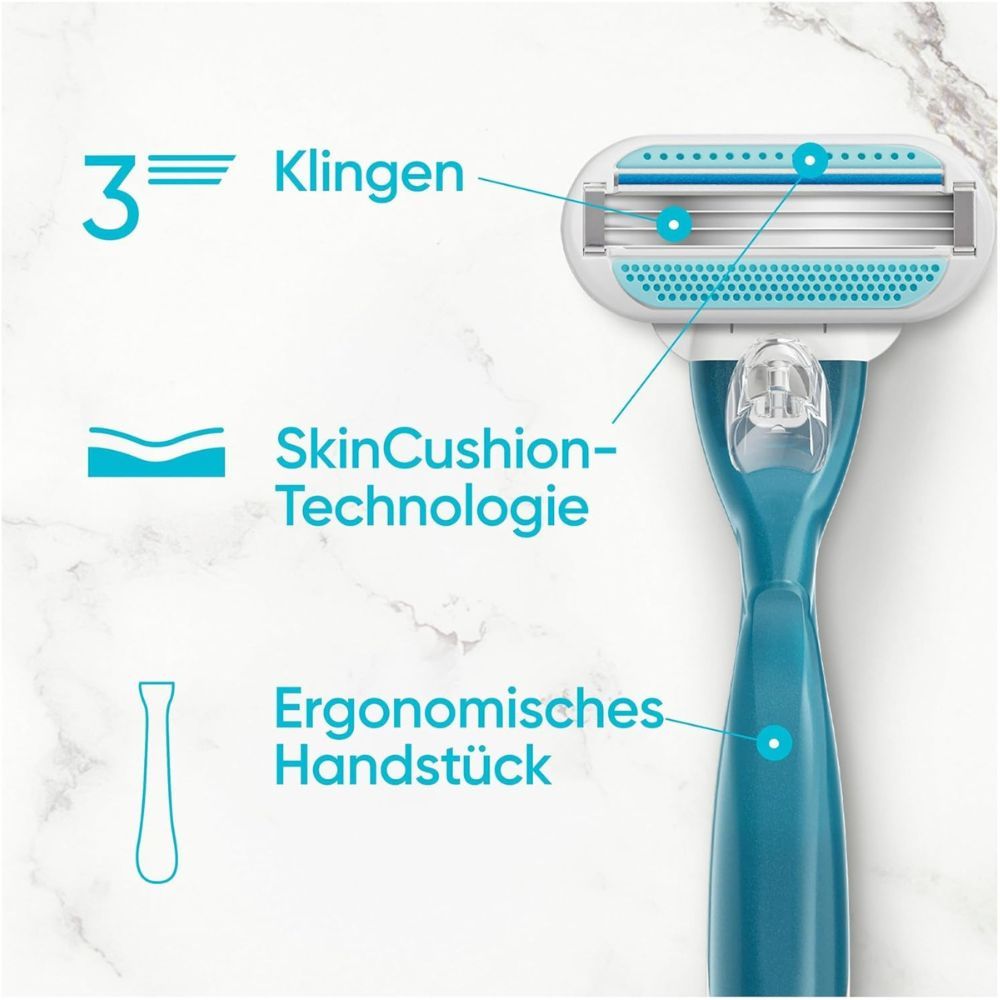 Nahaufnahme Rasierer. 3 Klingen, SkinCushion-Technologie, ergonomisches Handstück. Türkis-weiß.