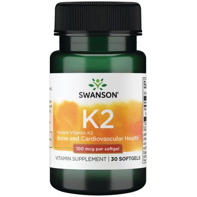 Grüne Flasche mit schwarzem Deckel. Aufschrift: SWANSON K2, Natural Vitamin K2, 100 mcg pro Softgel, 30 Softgels.