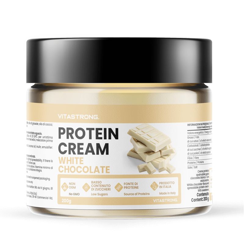 Glas mit Vitastrong Protein Creme Weiße Schokolade. Schwarzer Deckel, Produktname und Schokoladenstückchen abgebildet.