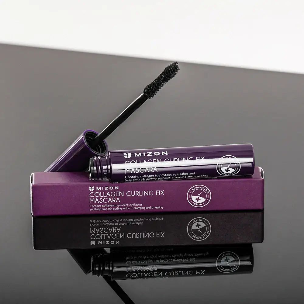 Lila Mascara-Tube und -Verpackung. Aufschrift: MIZON Collagen Curling Fix Mascara. Mit Bürste und Deckel.