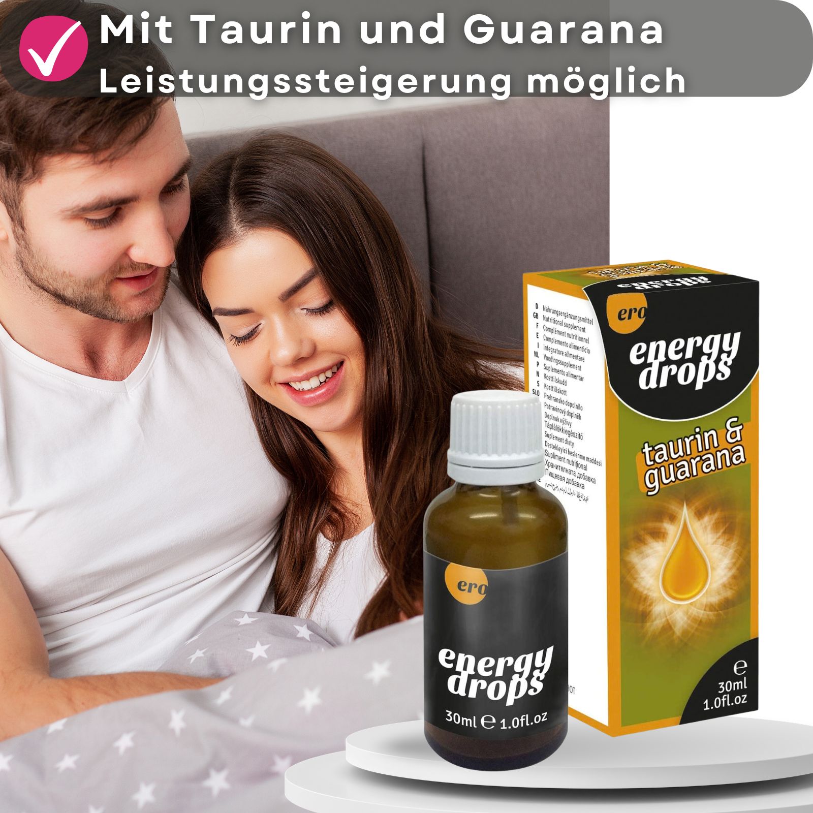 Paar im Bett, neben einer Flasche und Verpackung. Aufschrift: energy drops, Taurin & Guarana. Banner mit Text: Mit Taurin und Guarana, Leistungssteigerung möglich.
