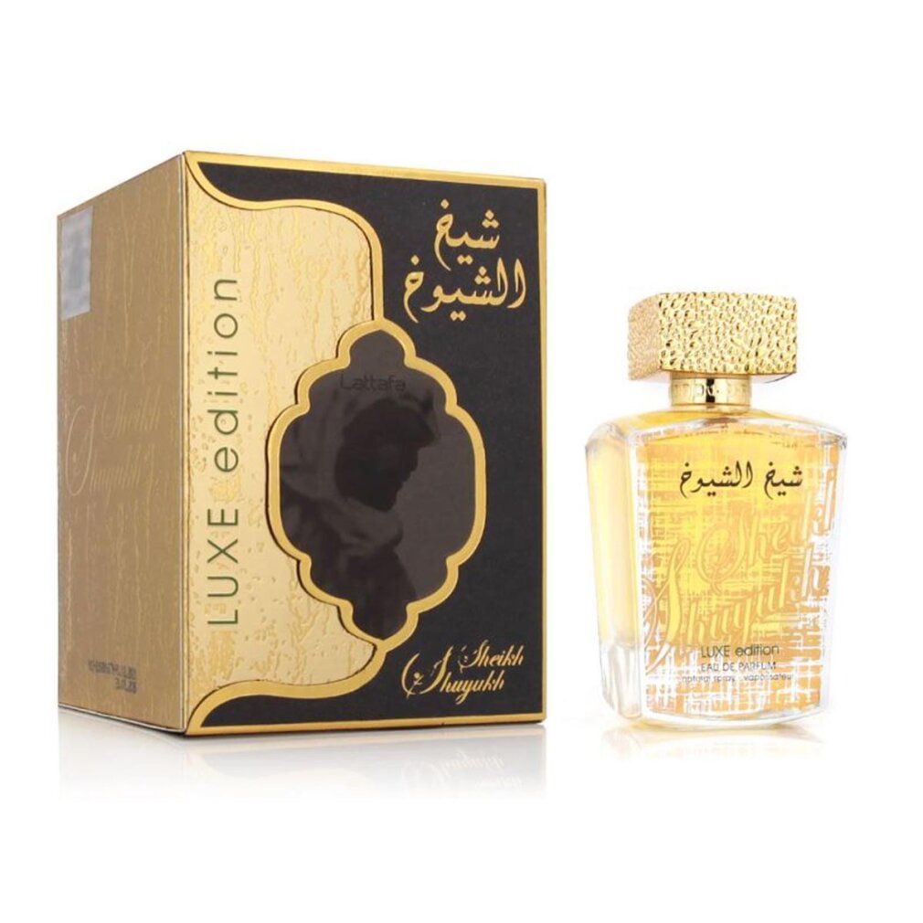 Parfümflasche und Verpackung. Goldfarbene Verpackung mit schwarzem Element und arabischer Schrift. Flasche mit goldenem Verschluss.
