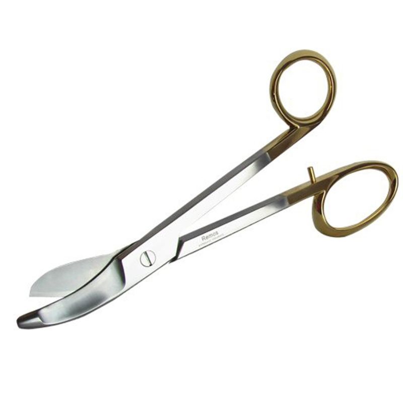 Gipsschere mit gebogener Klinge und goldenen Griffen. Marke: Ramia.