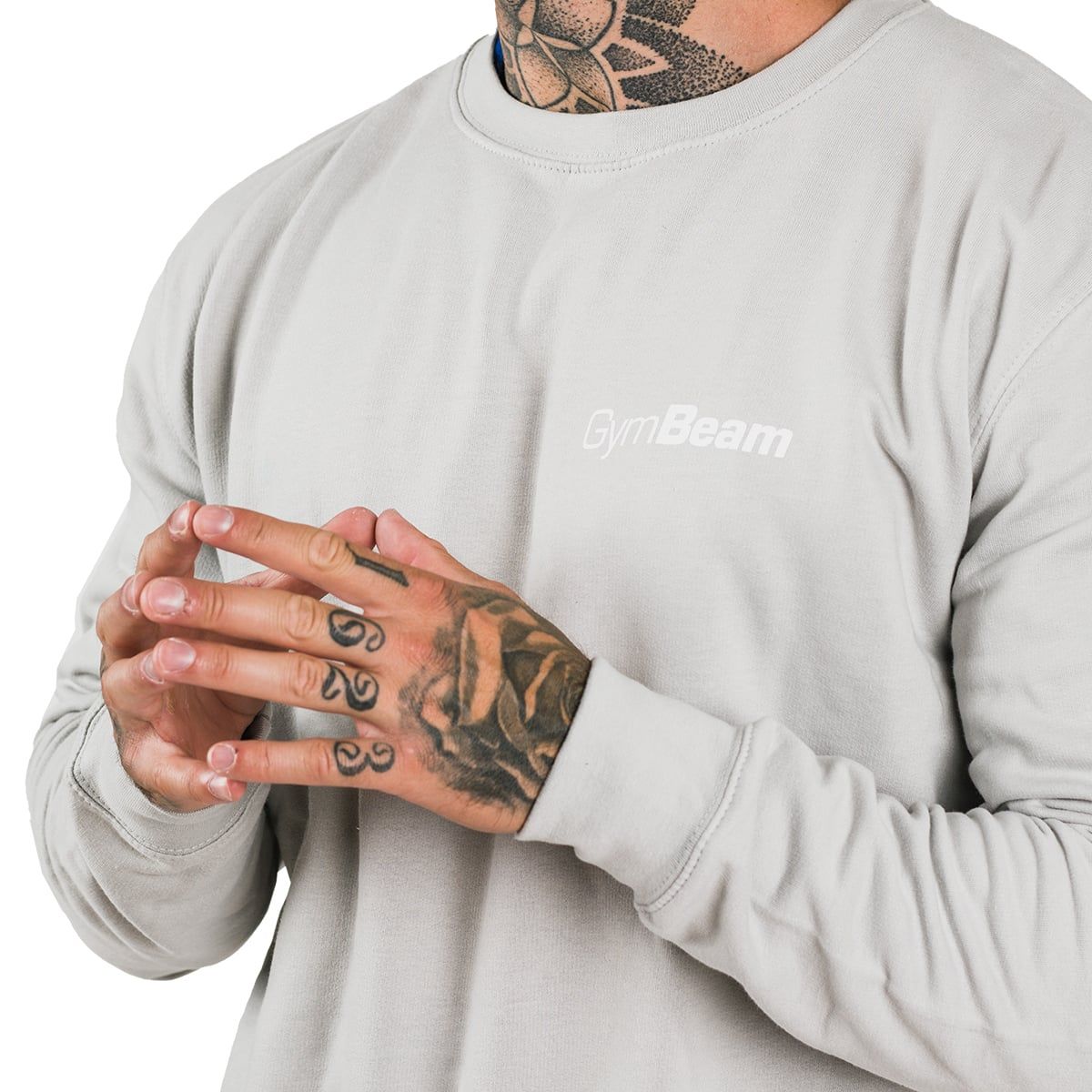 Detailansicht des Herren Pullovers PRO in Moon Grey, Fokus auf den Stoff und die Ärmelbündchen.