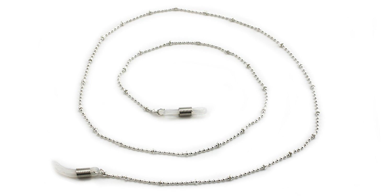 Brillenkette mit Kugel- und Kettengliedern. Metallische Farbe. Enden mit Schlaufen zur Befestigung an Brillenbügeln.