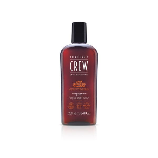 Braune Flasche mit schwarzem Deckel. Aufschrift: AMERICAN CREW Daily Cleansing Shampoo. 250ml.