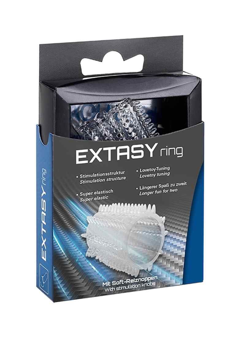 Verpackung mit transparentem EXTASYring. Produktname und Marke sichtbar. Text: Stimulationsstruktur, Super elastisch, Lovetoy-Tuning.