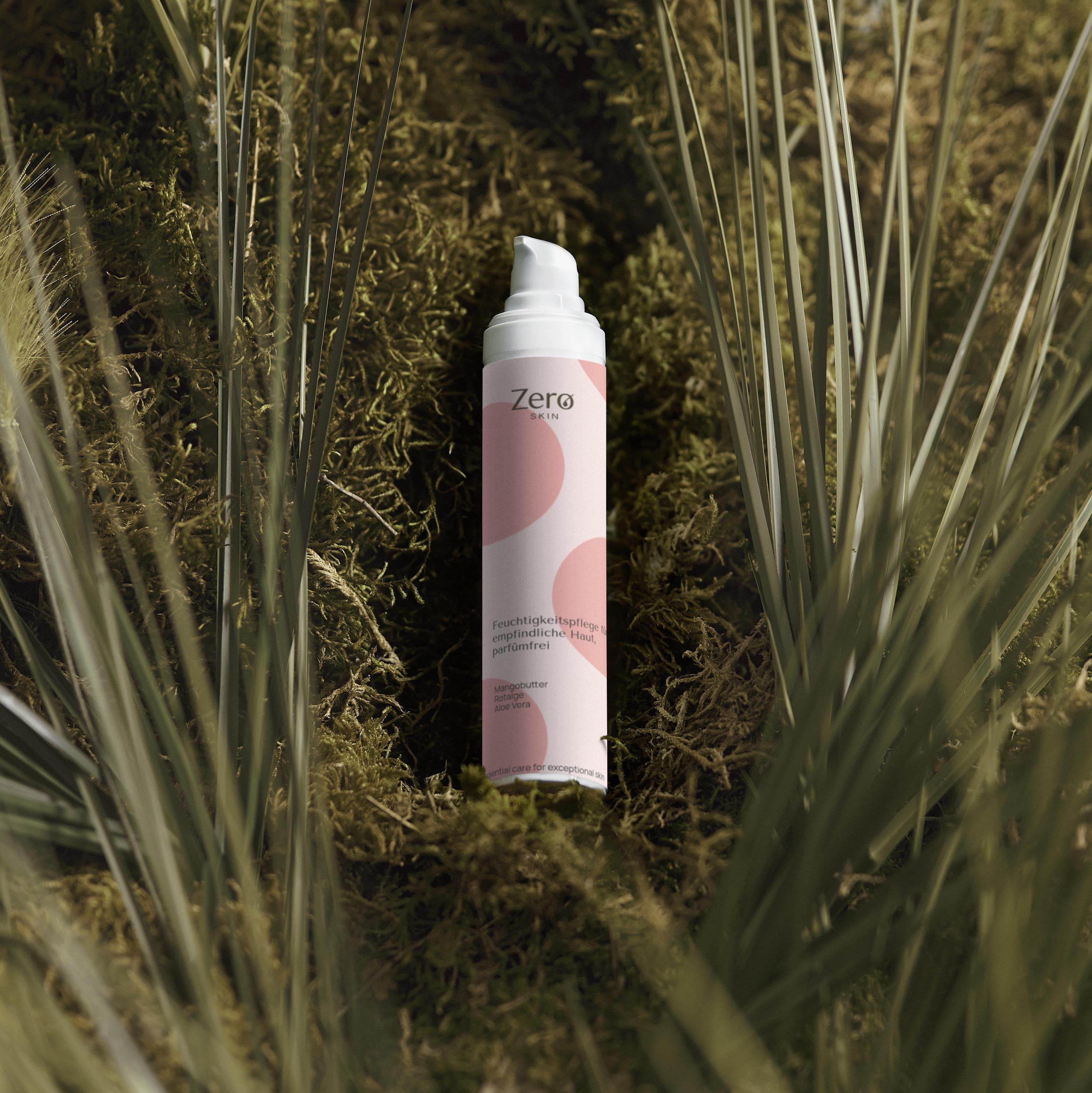 Weiße Pumpsprühflasche mit rosa Kreismuster und Aufschrift "Zero by Life".