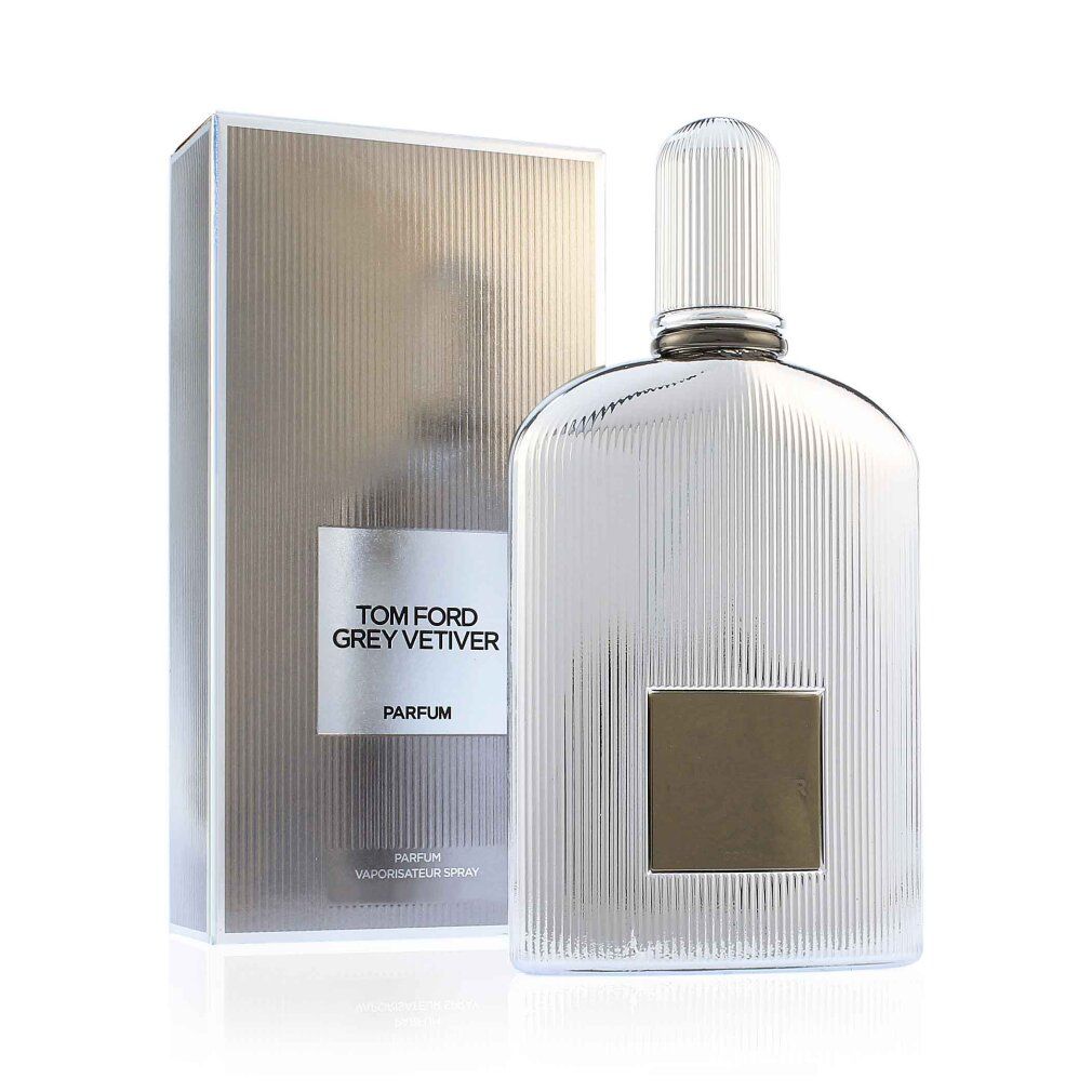 Parfümflakon und Verpackung. Silberfarbener Flakon mit geriffelter Oberfläche. Text: TOM FORD GREY VETIVER PARFUM.
