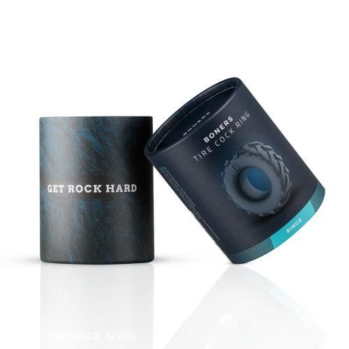 Zylindrische Verpackung mit Produktabbildung und Schriftzug 'BONERS TIRE COCK RING'.