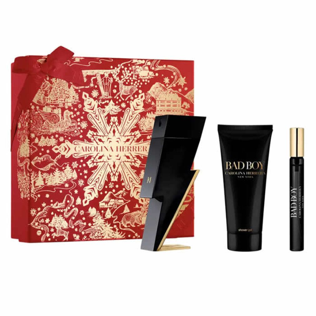 Geschenkset mit Parfümflakon, Duschgel und Duftprobe. Schwarze Flakons und Tube mit goldfarbenen Akzenten. Rote Geschenkbox mit Schleife.