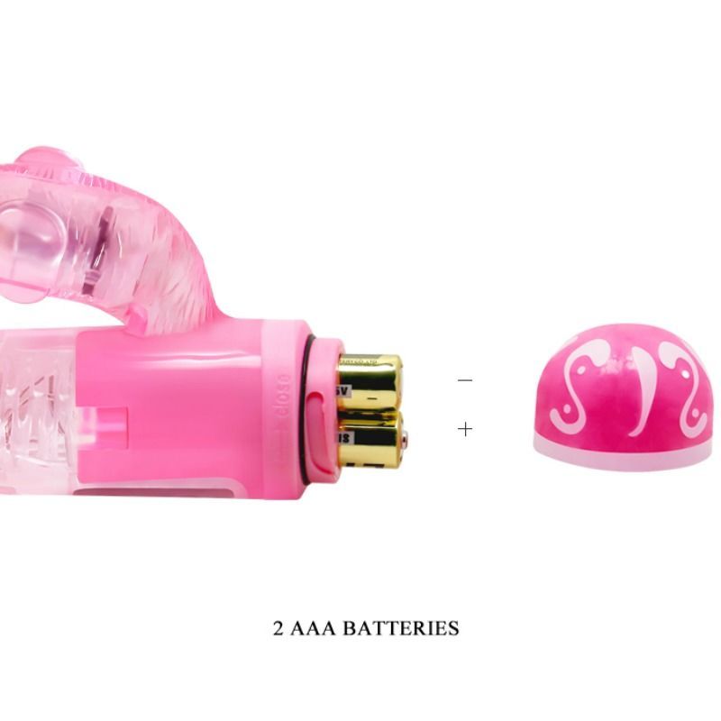 Rosa Vibrator mit transparenten Elementen. Batteriefach mit 2 AAA-Batterien. Abnehmbare Kappe.