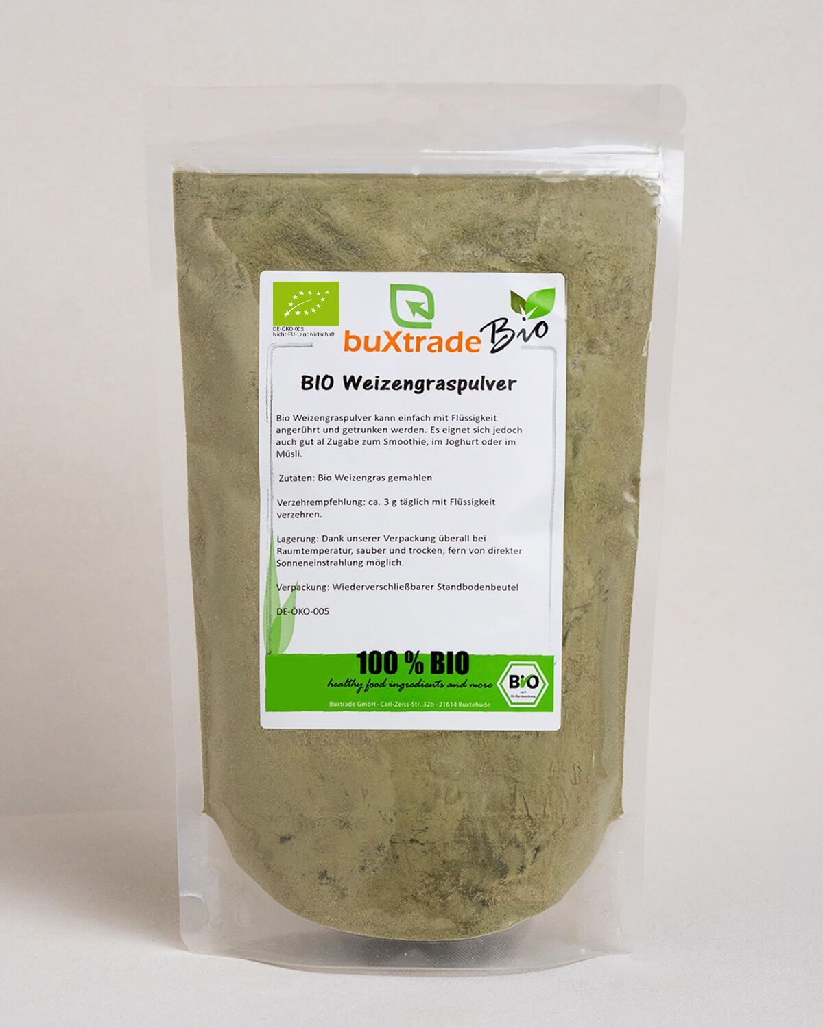 Verpackung von buxtrade Bio Weizengraspulver mit Bio-Siegel und Nährwertangaben.