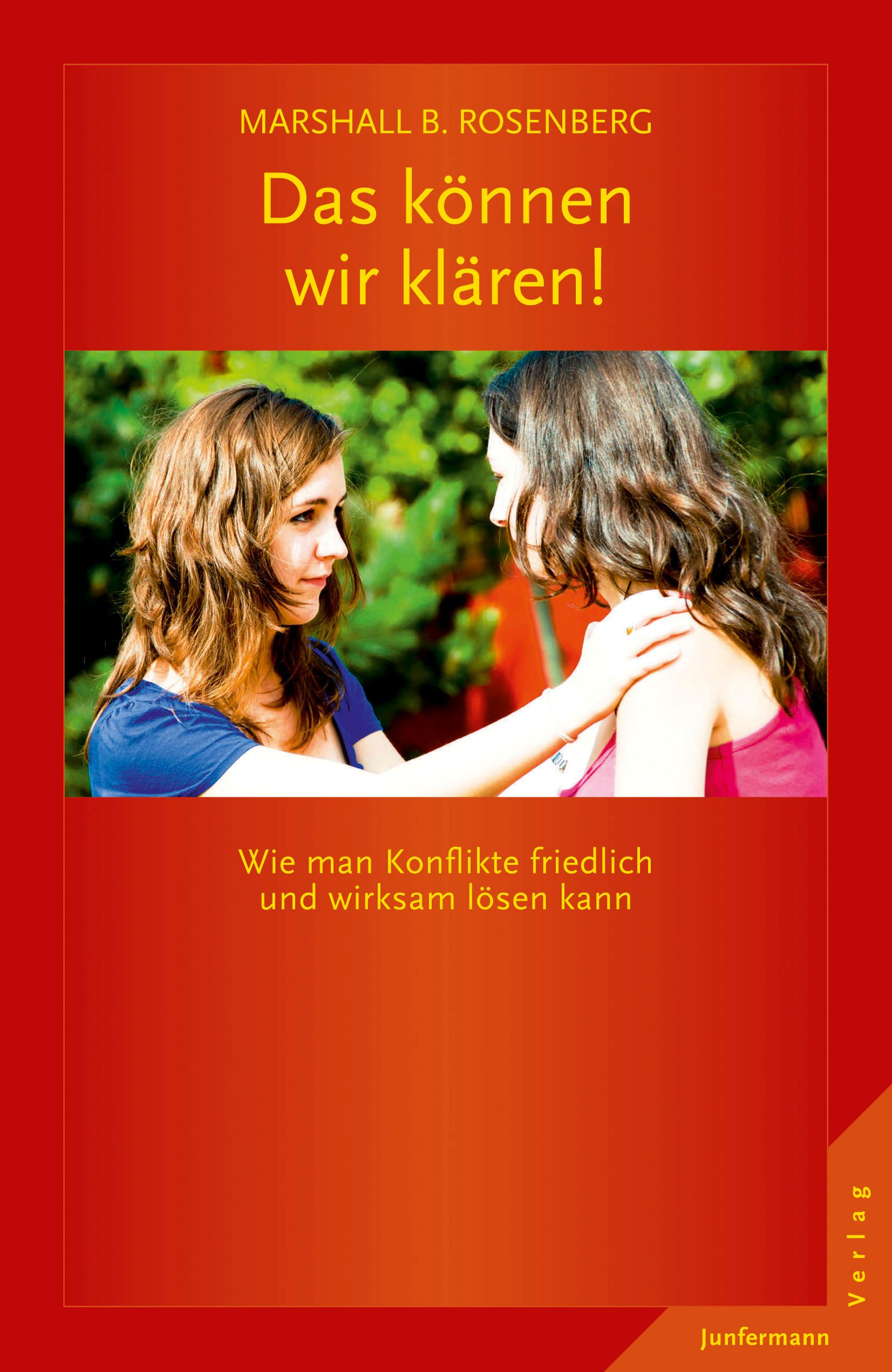 Buchcover mit zwei Frauen. Titel: Das können wir klären! Autor: Marshall B. Rosenberg. Untertitel: Wie man Konflikte friedlich lösen kann.