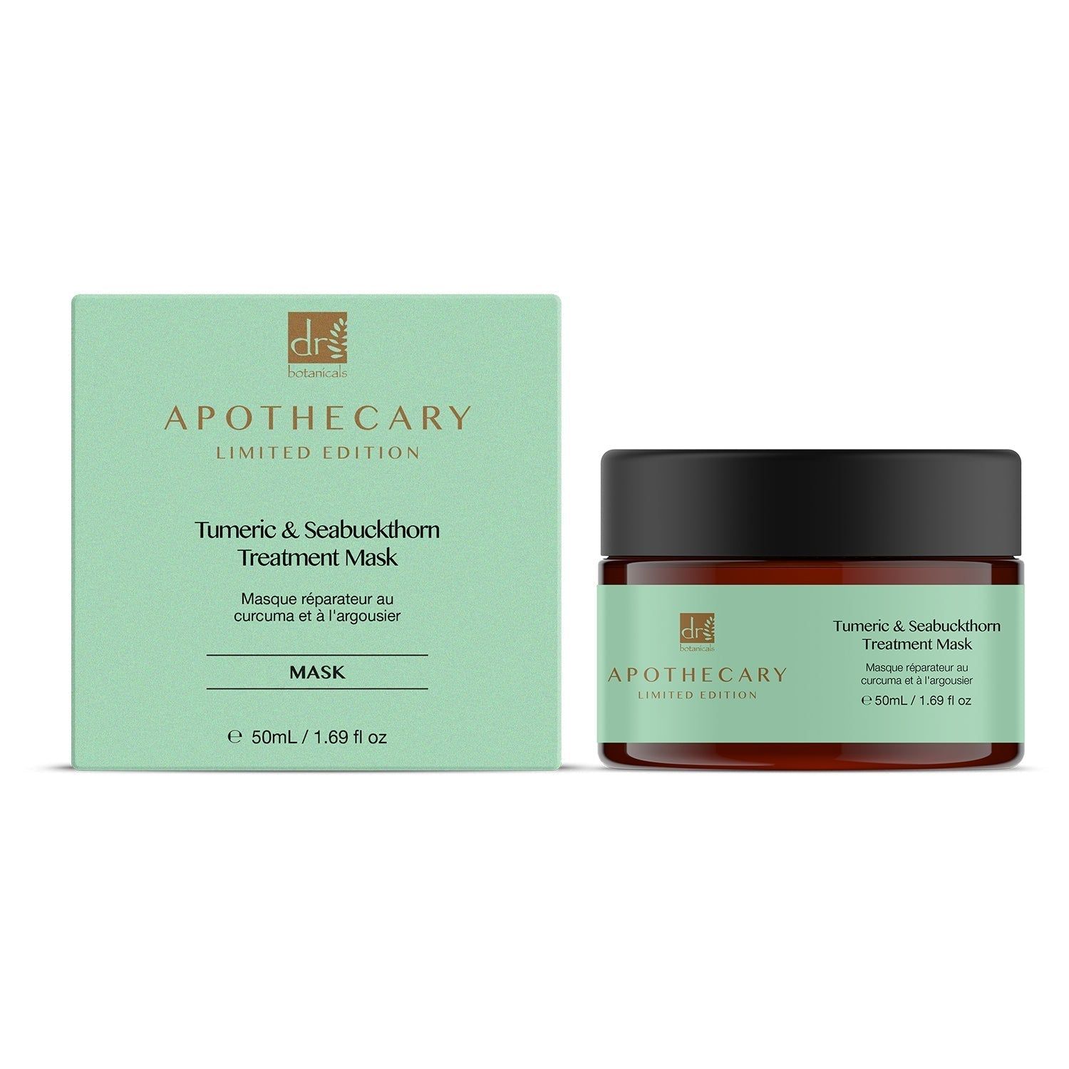 Produkt und Verpackung. Grüner Karton und brauner Tiegel mit schwarzem Deckel. Aufschrift: Tumeric & Seabuckthorn Treatment Mask.