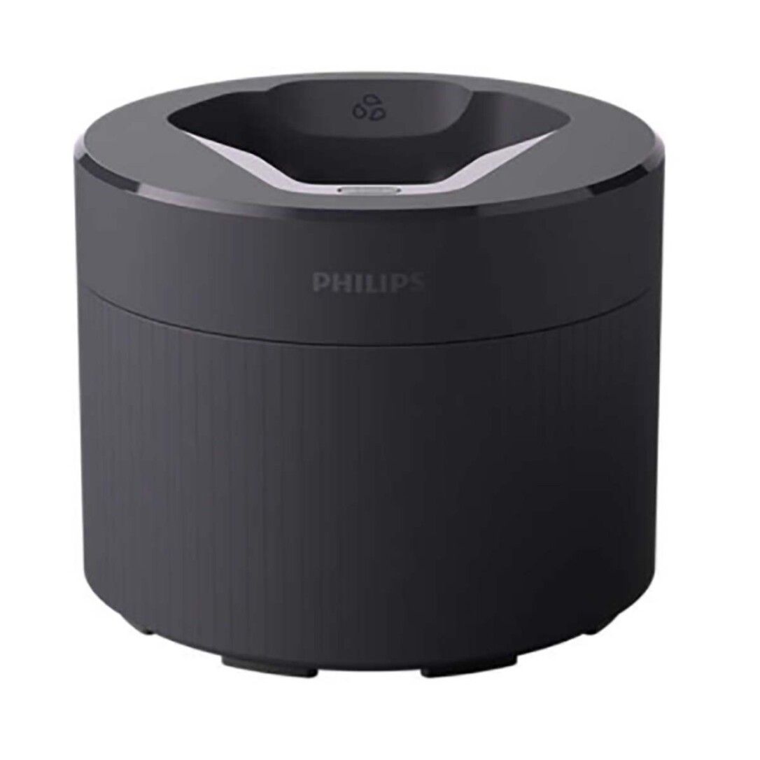 Schwarze, zylindrische Basis mit einer Aussparung oben. Der Name Philips ist auf der Vorderseite sichtbar.
