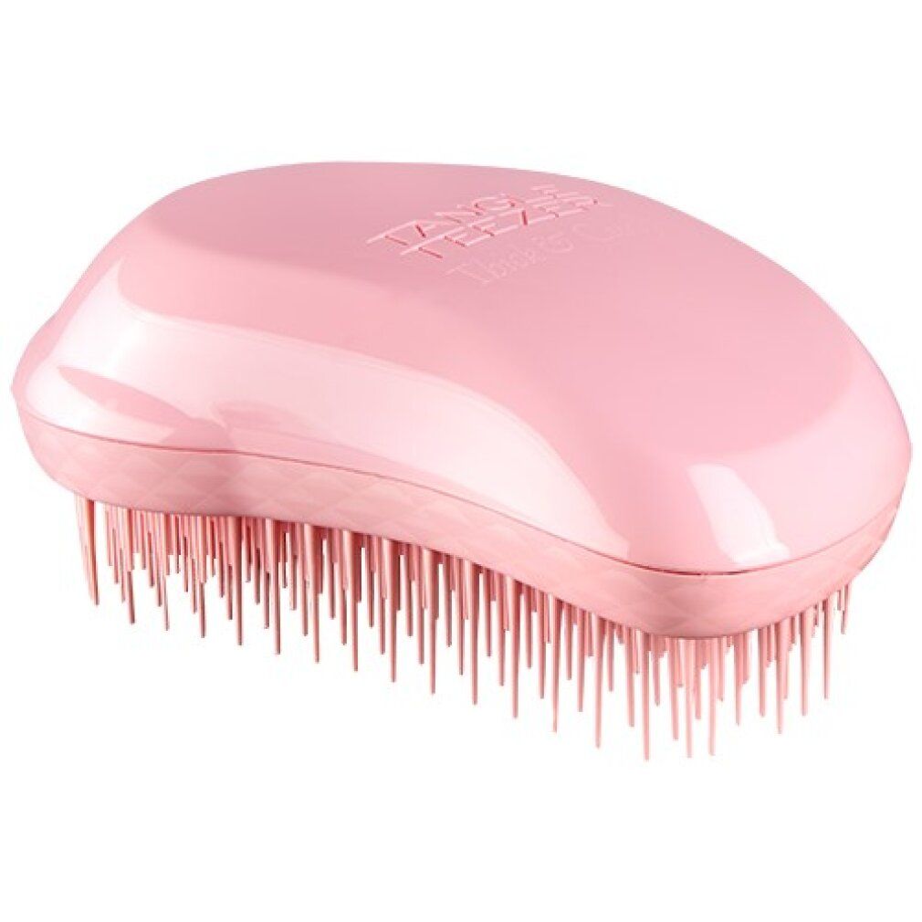 Haarbürste, rosa. Abgerundete Form mit Borsten. Marke: Tangle Teezer.