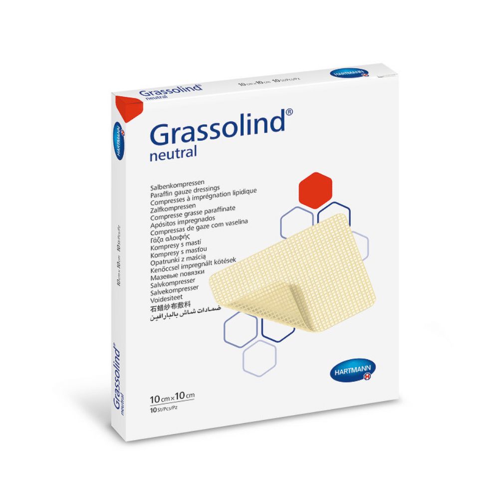 Verpackung von Grassolind neutral Salbenkompressen. Weißer Karton mit Produktnamen und Logo. Gezeigt wird eine Kompresse.