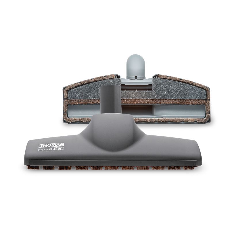 Bürstenkopf für Parkett. Grauer Bürstenkopf mit braunen Borsten. THOMAS Parquet.