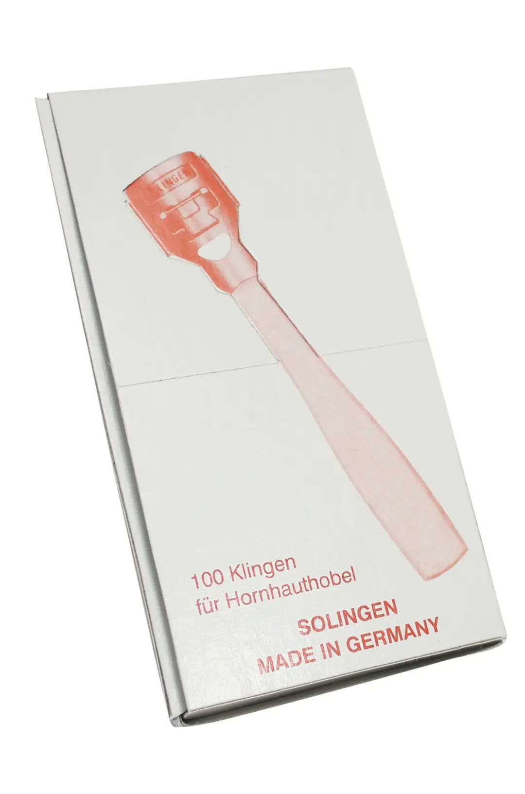 Verpackung mit 100 Klingen für Hornhautentferner. Auf der Verpackung ist eine rote Zeichnung eines Hornhautentferners abgebildet. Der Text auf der Verpackung lautet: "100 Klingen für Hornhautentferner", "SOLINGEN", "MADE IN GERMANY".