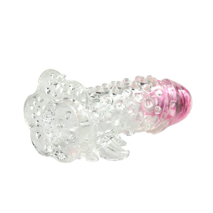 Penismanschette, transparent mit Noppen und rosa Spitze. Seitliche Ansicht.