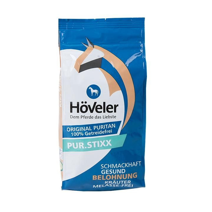 Blauer Beutel mit Produktnamen PUR.STIXX und Höveler-Logo. Text: Original Puritan, 100% getreidefrei, schmackhaft, gesund, Belohnung.