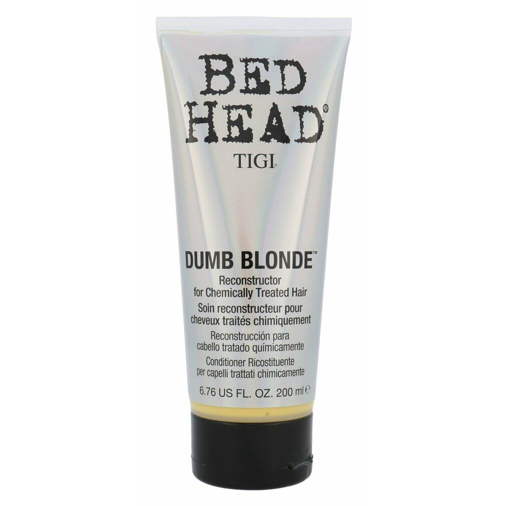 Tigi Bed Head Dumb Blonde Haarspülung. Tube mit schwarzem Verschluss. Text: Dumb Blonde, Reconstructor for Chemically Treated Hair. 200 ml.
