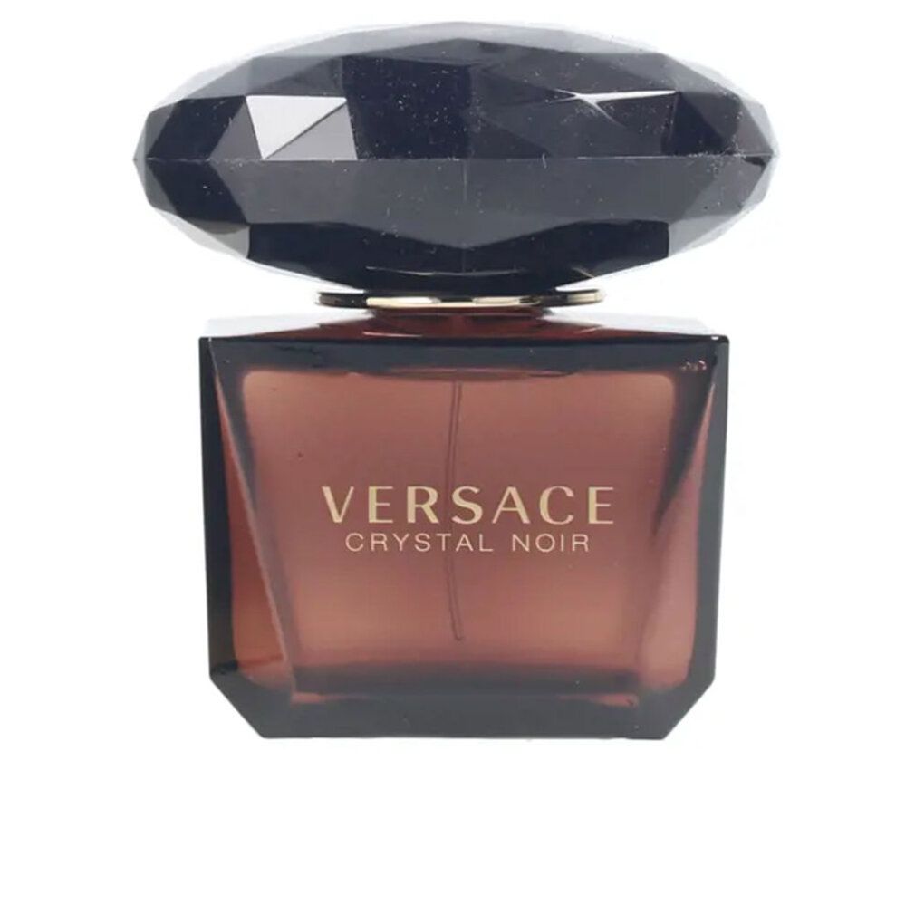 Versace Crystal Noir Flakon. Eckiger, braun-violetter Glasflakon mit schwarzem, facettiertem Deckel. Goldfarbener Schriftzug.