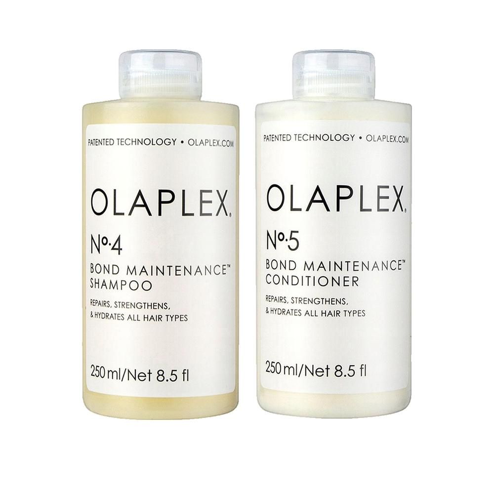 Zwei Flaschen. Aufschrift OLAPLEX, Nr. 4 und Nr. 5. Shampoo und Conditioner. Weiße Flaschen mit gelbem Etikett.