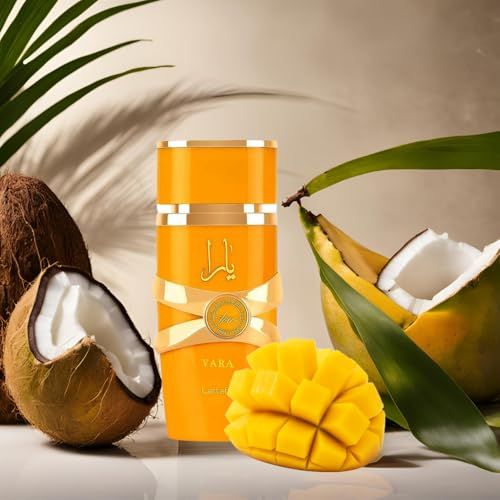 Yara Tous Parfumflakon mit Früchten und Blättern. Gelber Flakon mit goldfarbenen Akzenten. Kokosnuss, Mango.